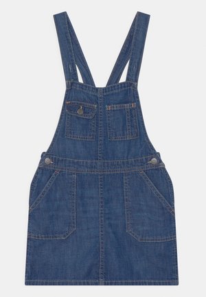 Jeans-Latzkleid mit verstellbaren Schulterriemen, zwei vorderen Taschen, einer Klappentasche mit Knopf und seitlichen Knopfverschlüssen.