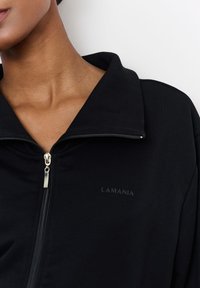 LA MANIA Mikina so zipsom - black
