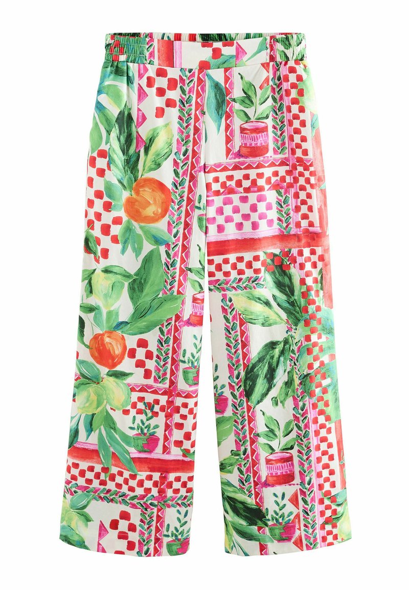 Pantalon large à motif floral présentant un fond blanc avec des feuilles vertes, des fruits orange et des motifs géométriques roses. Taille élastique.