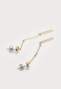 Gold and silver drop earrings featuring rectangular bars with clear rhinestones, connected by thin metal chains and circular backs.