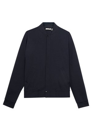 Veste bomber bleu marine avec un col côtelé, fermeture à pression à l'avant et deux poches latérales. Fabriquée en tissu lisse avec un design minimaliste.