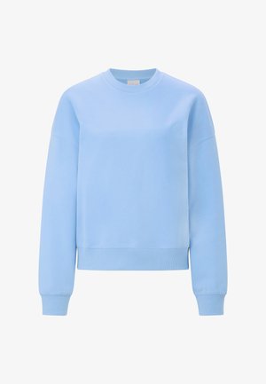 Svetlo modra jopa z okroglim izrezom, rebrastimi manšetami in robom. Na prsih ima subtilen reliefni logotip. Klasičen, sproščen kroj.