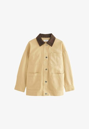 Beež puuvillane jakk pruunist korduurkaelusest, trukkidega ja kahe eesmine taskuga. Omab meeldivat lõiget ja pikki varrukaid.