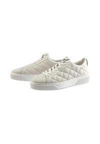 Quilted white leather sneakers with a textured design, flat white rubber soles, and white shoelaces. Features a low-top silhouette.