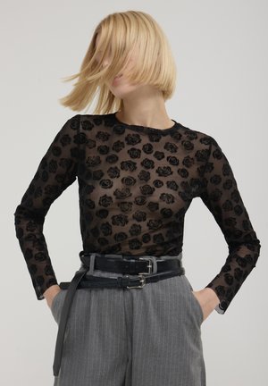 FLOCK FAN - Blouse - une variante