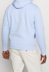 Tommy Hilfiger Jersey con capucha - light blue