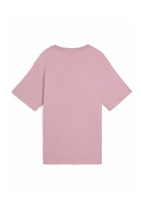Lyserød bomulds t-shirt med løs pasform, korte ærmer og rund halsudskæring. Enkel design uden yderligere mønstre eller accenter.