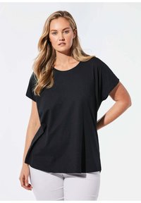 Schwarzes T-Shirt mit kurzen Ärmeln, Rundhalsausschnitt, lässiger Passform und weicher Textur. Der Stoff fällt locker über die Schultern.