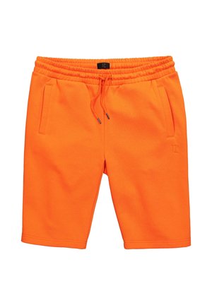 Jasně oranžové šortky délky ke kolenům s elastickým pasem, šňůrkou na stažení, bočními kapsami a jemným logem JP na pravé noze.