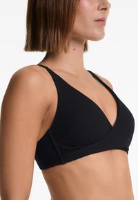 OYSHO PIQUÉ CROSSOVER HALTER - Zgornji del kopalk - black