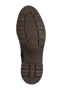 Brązowa gumowa podeszwa z teksturowanym gripem, z poziomymi i pionowymi rowkami, wytłoczonym logo oraz oznaczeniem rozmiaru.