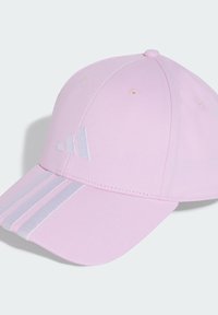 Pink baseball cap made of cotton, featuring a curved brim, embroidered logo, and three white stripes on the front panel.