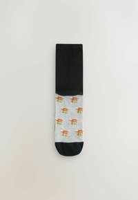 Zwarte en grijze sokken met een cartoonpatroon van dierengezichten in oranje en groen. Getextureerde stof met contrasterende effen kleuren manchet.