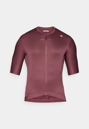 Maglia da ciclismo bordeaux con maniche corte, tessuto testurizzato, zip frontale e dettaglio del logo sulla spalla. Design minimalista e forma aderente.