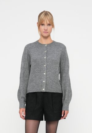 Gray wool cardigan with a round neckline, button closure, and long sleeves. Pairing with black textured shorts.