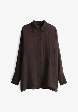 Donkerbruine knoopsluiting shirt van lichtgewicht stof. Heeft een klassieke kraag, lange mouwen en een ontspannen pasvorm met een licht gebogen zoom.