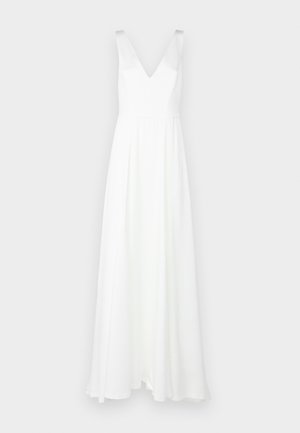 White, floor-length dress with a V-neckline and wide straps. Made from lightweight fabric, featuring a flowing skirt and minimal design.