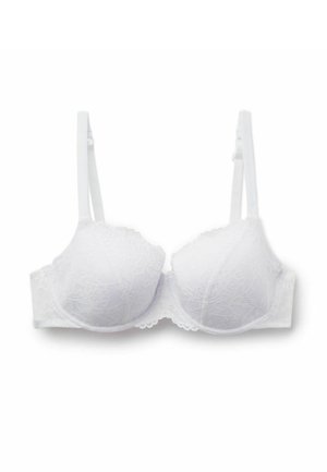 Biały koronkowy biustonosz z fiszbinami, regulowanymi ramiączkami, postrzępionymi brzegami i bezszwowym wzorem z motywem kwiatowym.