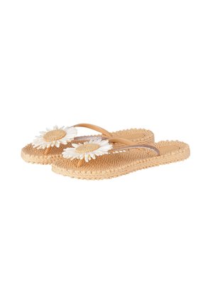Beige gewebte Flip-Flops mit hellbraunen Riemen, die jeweils oben mit einer großen weißen Gänseblümchen-Blume verziert sind.