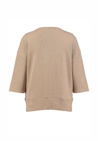 Beige oversized gebreide trui met korte mouwen, een ruime halslijn en een licht korter gesneden zoom. Heeft een gestructureerde stof.