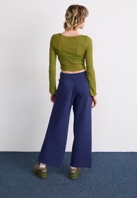 Nike Sportswear PANT - Teplákové kalhoty - ashen slate