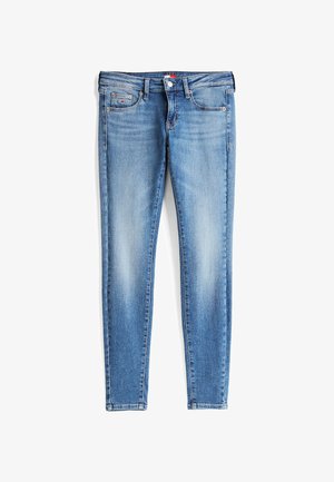 Jeans skinny in denim azzurro chiaro, con un classico design a cinque tasche, chiusura con zip e leggere sfumature lungo le gambe.