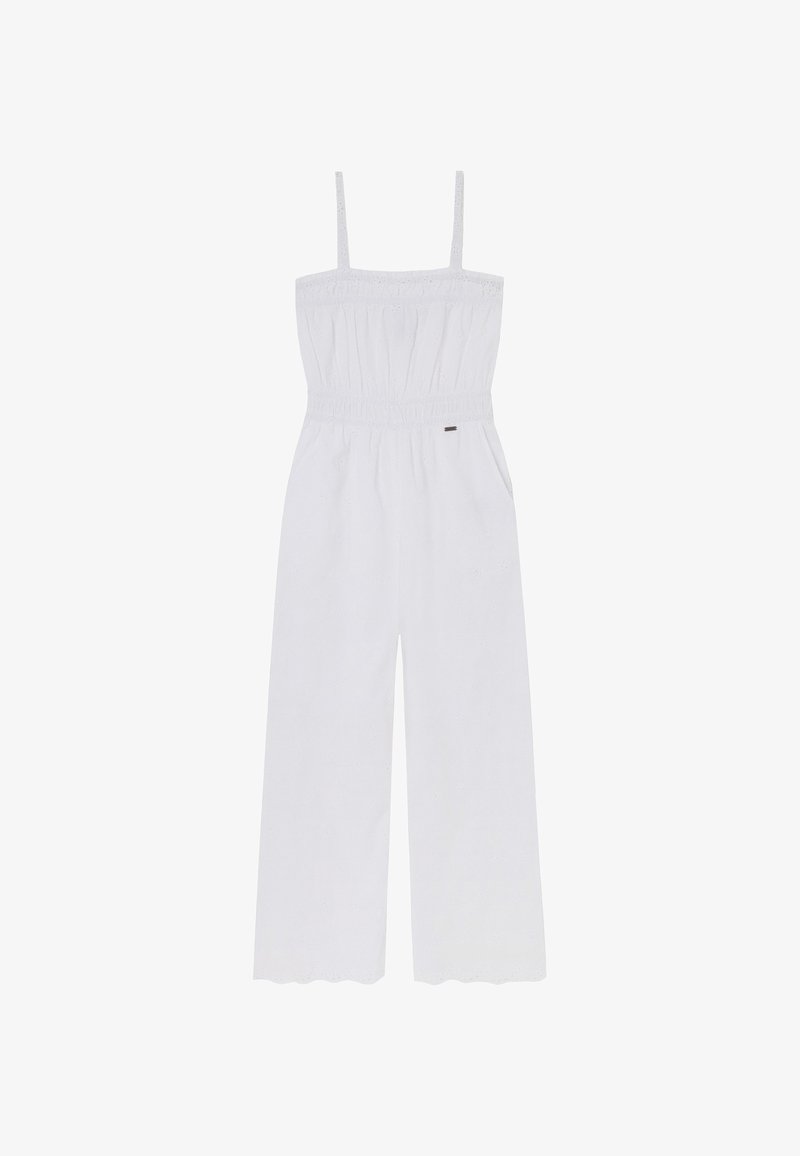 Tuta bianca con spalline sottili, vita elastica e pantaloni a gamba larga. Presenta un orlo scallop e un tessuto leggermente testurizzato.