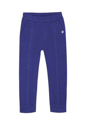 Lila Jogginghosen mit elastischem Bund, zwei Seitentaschen und gerippten Säumen. Aus weichem Stoff mit Nahtdetails.