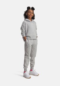 Under Armour RIVAL FLEECE - Pantalon de survêtement - mod gray light heather