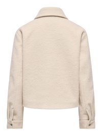 Jakke i cremegult uldblanding med klassisk krave, lange ærmer og knaplukning ved manchetterne set bagfra.