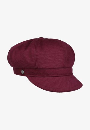 Bordeauxrote Wollkappe im Baker-Boy-Stil mit abgerundetem Kranz, kurzem, steifem Schirm und kleinem Metallknopf an der Seitenbinde.