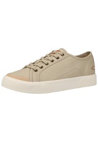 Beige canvas sneakers feature a rounded toe, lace-up design, light beige rubber sole, and subtle branding on the side.