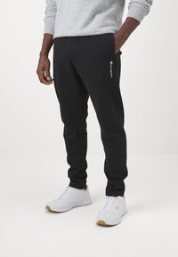 Champion ICONS HEM PANTS - Treniņtērpa apakšdaļas - black