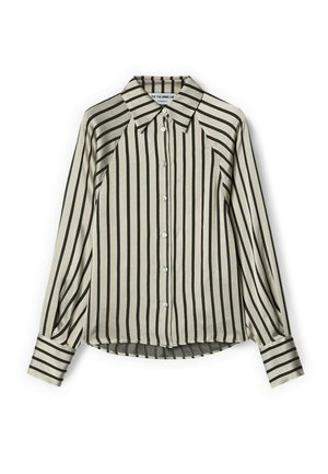 Camicia beige con bottoni, strisce verticali nere, maniche lunghe, colletto a punta e polsini a righe, stesa su sfondo bianco.