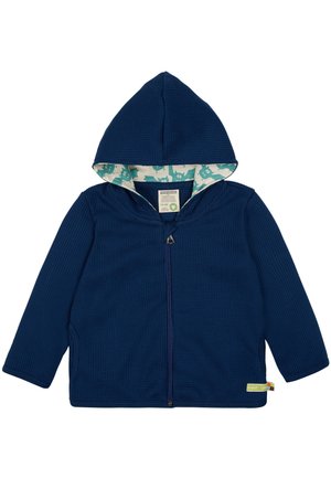 Marineblaue Zip-Hoodie mit einer strukturierten Waffelstrick-Oberfläche und einem gemusterten hellblauen Innenfutter mit Tiermotiven.