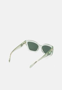 COACH Slnečné okuliare - transparent pistachio