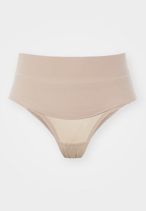 Beżowy thong o wysokim stanie o gładkiej teksturze. Posiada bezszwowy design, miękką gumkę w talii oraz minimalistyczny krój.