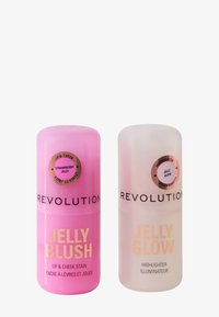Twee cilinderachtige containers naast elkaar: een roze met het label "Jelly Blush" en een doorzichtige met het label "Jelly Glow", beide met ronde deksels en branding.