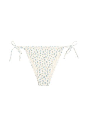 Culotte de bikini crème avec motif floral bleu et liens latéraux ajustables, posée à plat sur un fond blanc.
