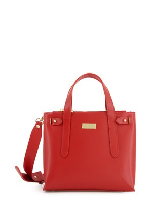 Red leather handbag with dual top handles, detachable shoulder strap, gold hardware, and a textured finish; features a prominent brand logo.