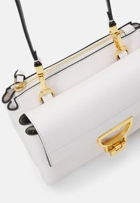 Arlettis Handbag
