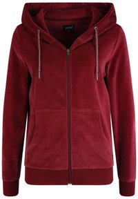 Burgunderfarget hettegenser med glidelås i myk fleece, med snor i hetten, frontlommer, og ribbestrikkede mansjetter og kant.
