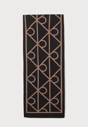 Sort rektangulært tekstil med et gentagende beige geometrisk mønster af trekanter og halvcirkler, der danner et gitter.