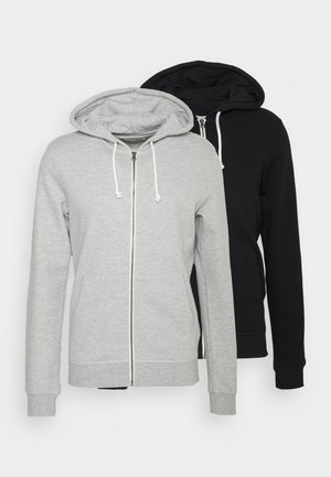 Two hooded sweatshirts: one gray with a zip front, drawstrings, and pockets; one black with similar features, both made of soft fabric.