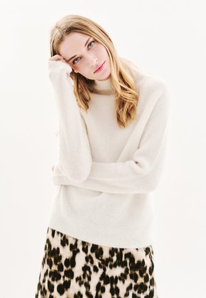- Sweter