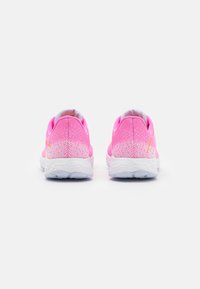 Pink athletic shoes with a textured mesh upper, a white midsole, and yellow accents. The heel features a cushioned design for comfort.