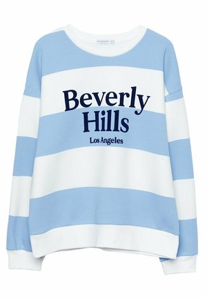 Sweater met lange mouwen met brede horizontale blauwe en witte strepen, met de tekst "Beverly Hills Los Angeles" in marineblauw op de voorkant.