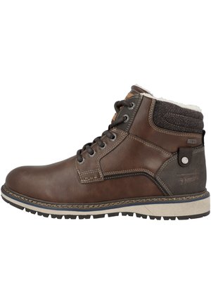 Brown leather ankle boot with a fur-lined collar, textured fabric accents, and a rubber sole, featuring metal eyelets and stitched detailing.