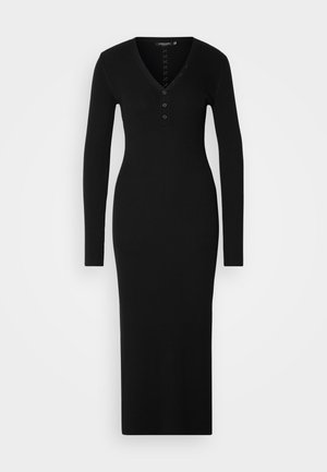 Black ribbed dress with long sleeves, V-neck, and button accents down the front. Fitted silhouette and floor-length design.