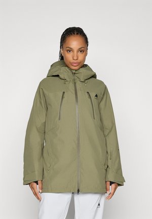 Olive green waterproof jacket featuring a hood, zippered pockets, adjustable cuffs, and a relaxed fit design. Smooth, durable fabric.